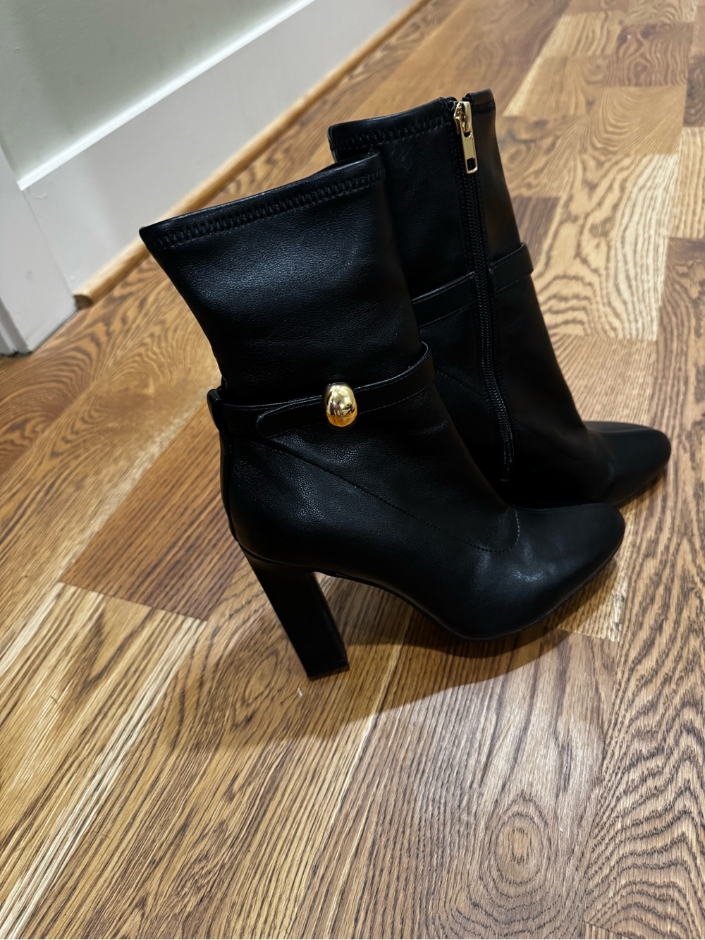 Steve Madden Black High-Heel Ankle Boots with Gold Accent